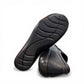 Clarks Ashland Effie black leather slip-on shoe with round toe and decorative button detail. bottom view.