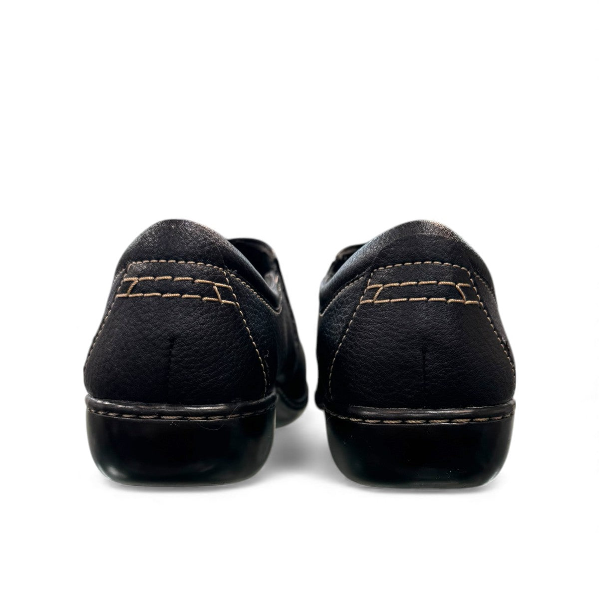 Clarks Ashland Lane Q black leather slip-on shoe with decorative buttons and contrast stitching. back view.