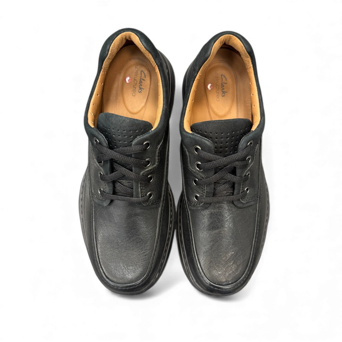 Clarks Un Brawley Lace black leather casual shoe with stitch detailing and a flexible sole. top view