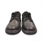 Clarks Un Brawley Lace black leather casual shoe with stitch detailing and a flexible sole. front view.