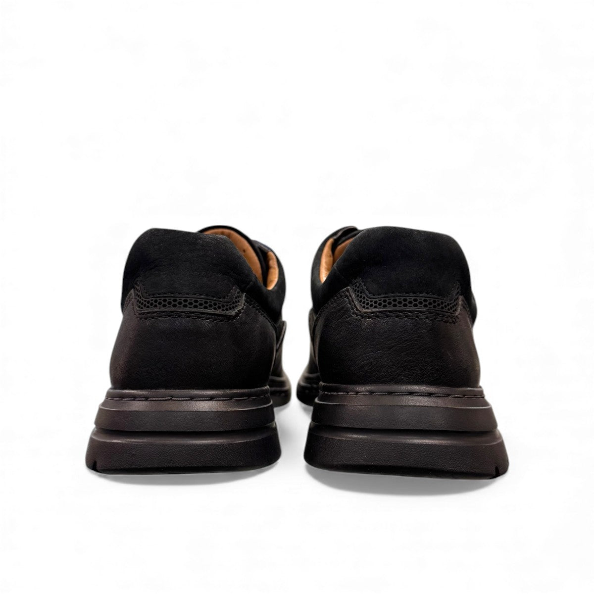 Clarks Un Brawley Lace black leather casual shoe with stitch detailing and a flexible sole. back view.