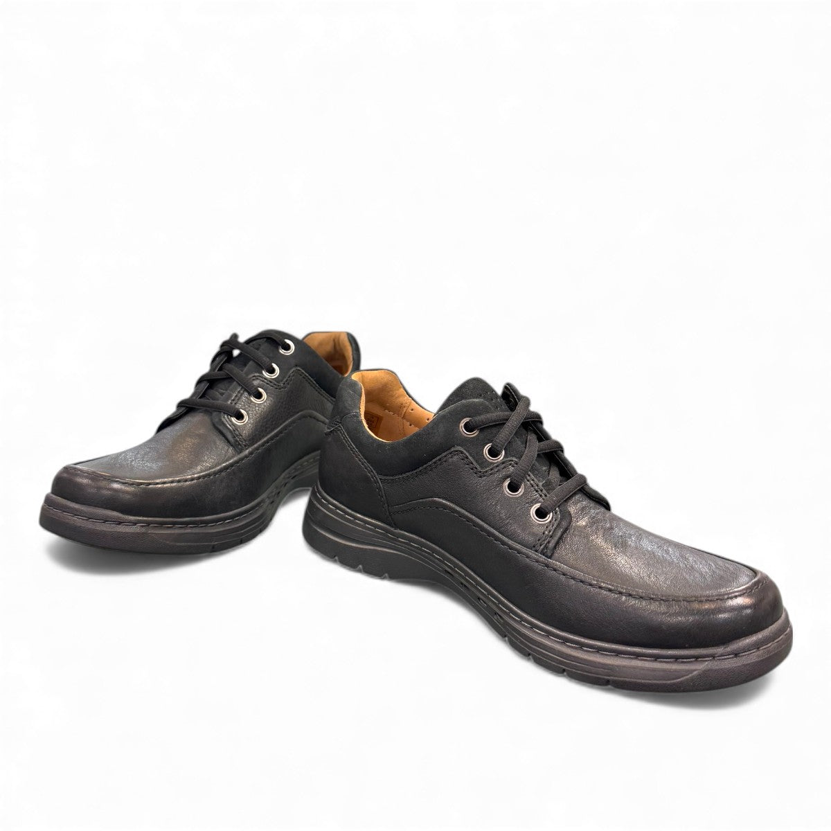 Clarks Un Brawley Lace black leather casual shoe with stitch detailing and a flexible sole. front view