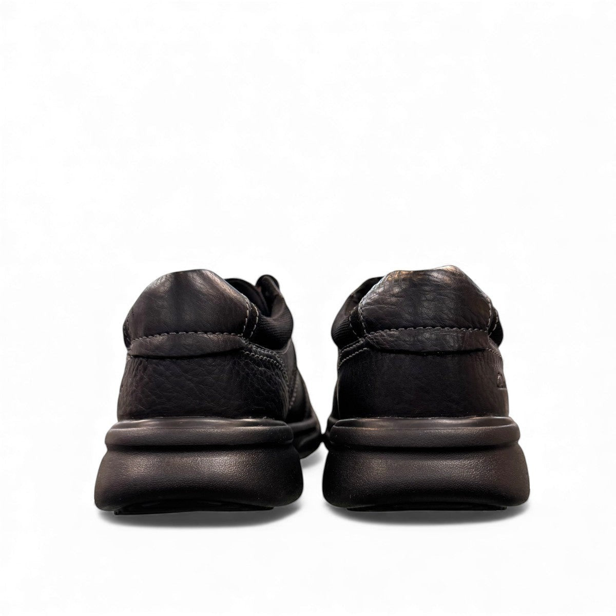 Clarks Bradley Walk black leather lace-up shoe with durable EVA outsole and cushioned footbed. back view.