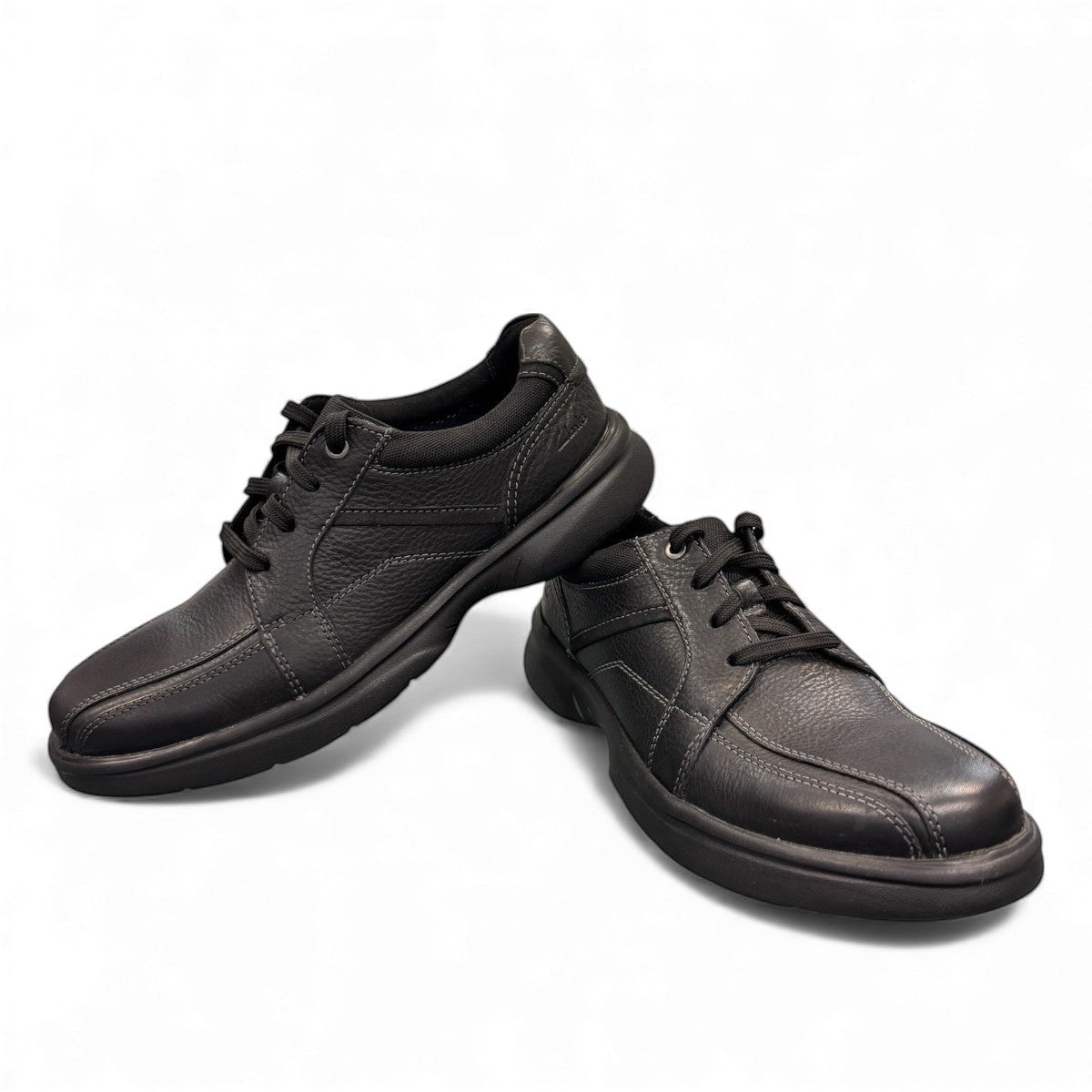 Clarks Bradley Walk black leather lace-up shoe with durable EVA outsole and cushioned footbed. front view.