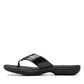 Clarks Breeze Sea black patent flip-flops with a lightweight sole and adjustable strap closure. left view.