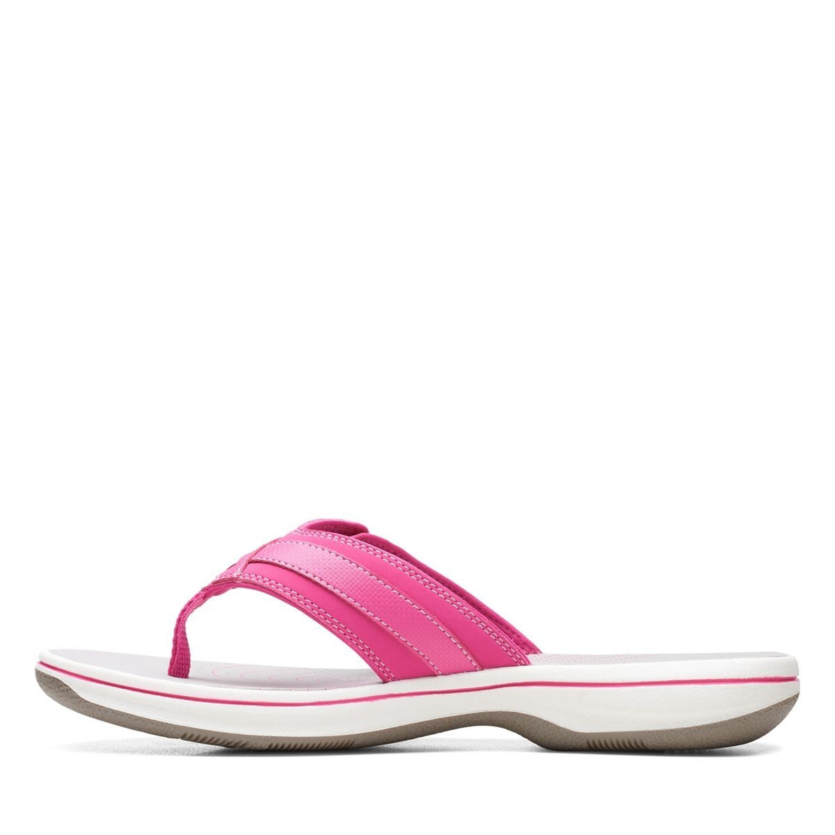 Clarks Breeze Sea fuchsia flip-flops with a lightweight sole and adjustable strap closure. left view.