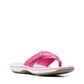 Clarks Breeze Sea fuchsia flip-flops with a lightweight sole and adjustable strap closure. front view.