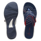 Clarks Breeze Sea navy and red flip-flops with star pattern, adjustable strap, and lightweight sole. top view