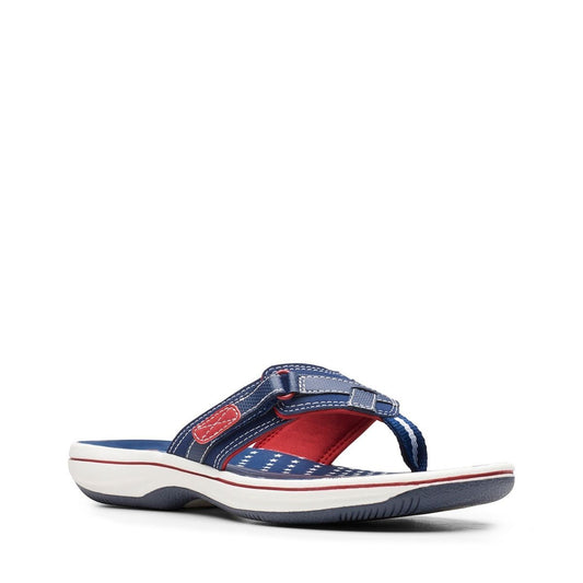 Clarks Breeze Sea navy and red flip-flops with star pattern, adjustable strap, and lightweight sole. right view.