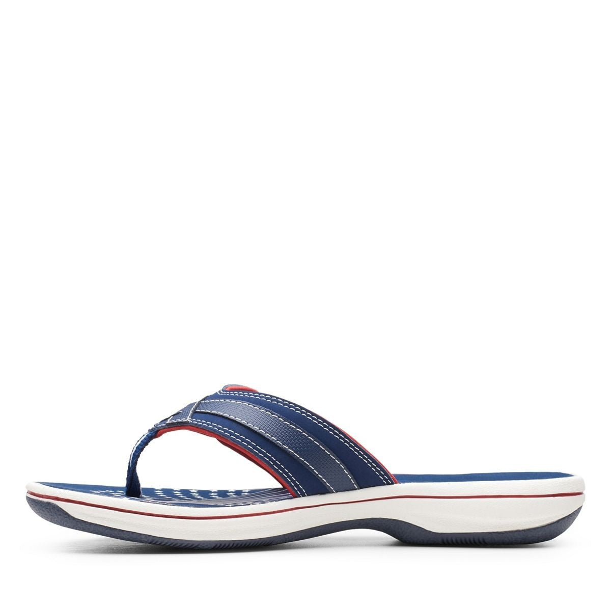 Clarks Breeze Sea navy and red flip-flops with star pattern, adjustable strap, and lightweight sole. left view.