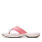 Clarks Breeze Sea flip-flops in orange-pink with a lightweight sole and adjustable strap closure. left view.
