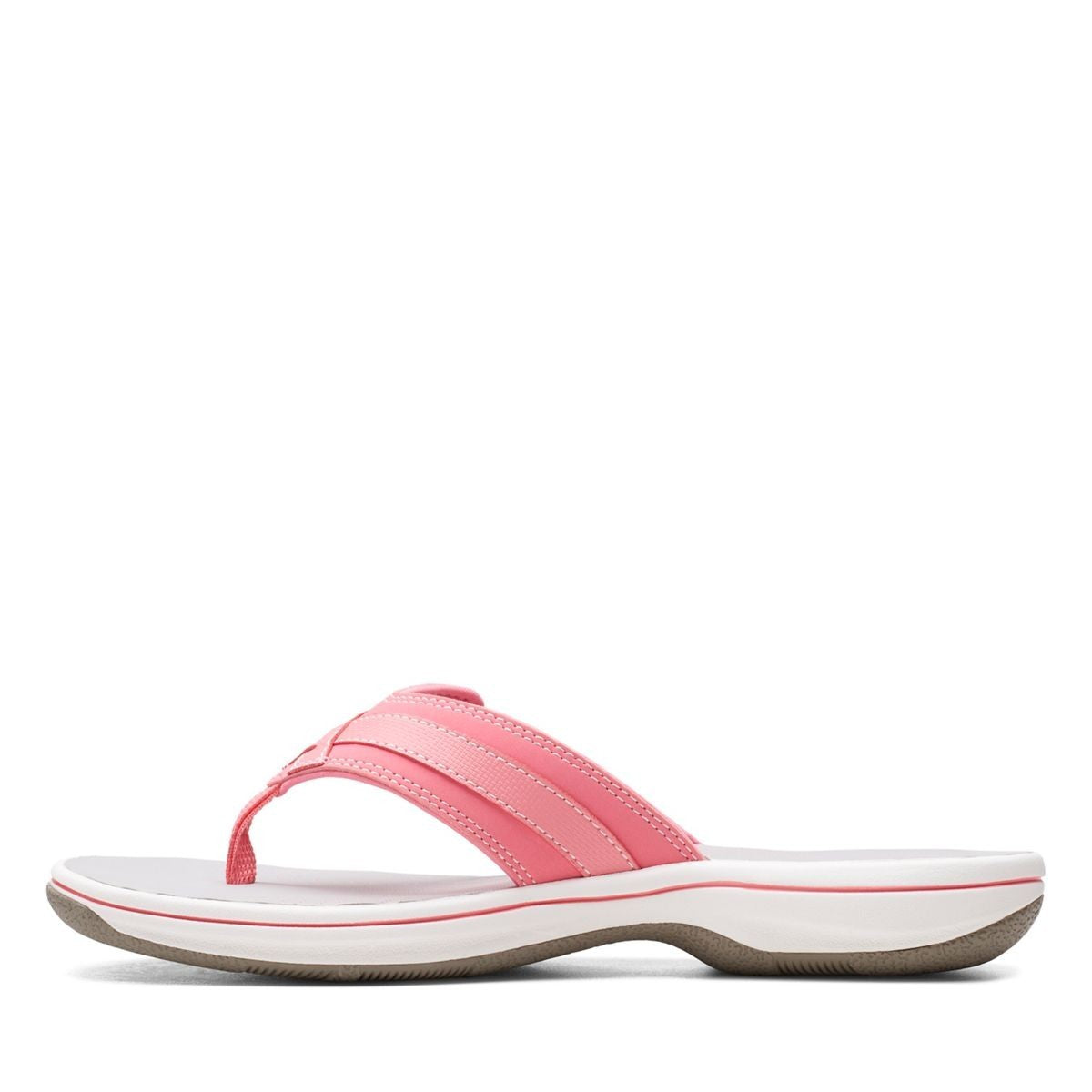 Clarks Breeze Sea flip-flops in orange-pink with a lightweight sole and adjustable strap closure. left view.