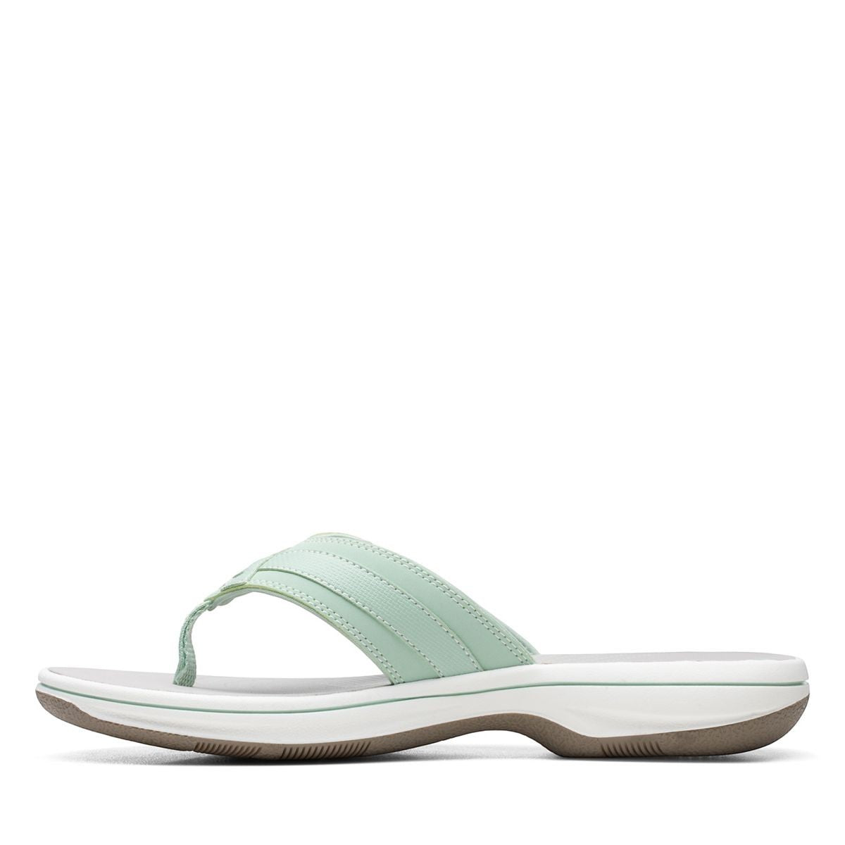 Clarks Breeze Sea flip-flops in pale green with a lightweight sole and adjustable strap closure. left view.