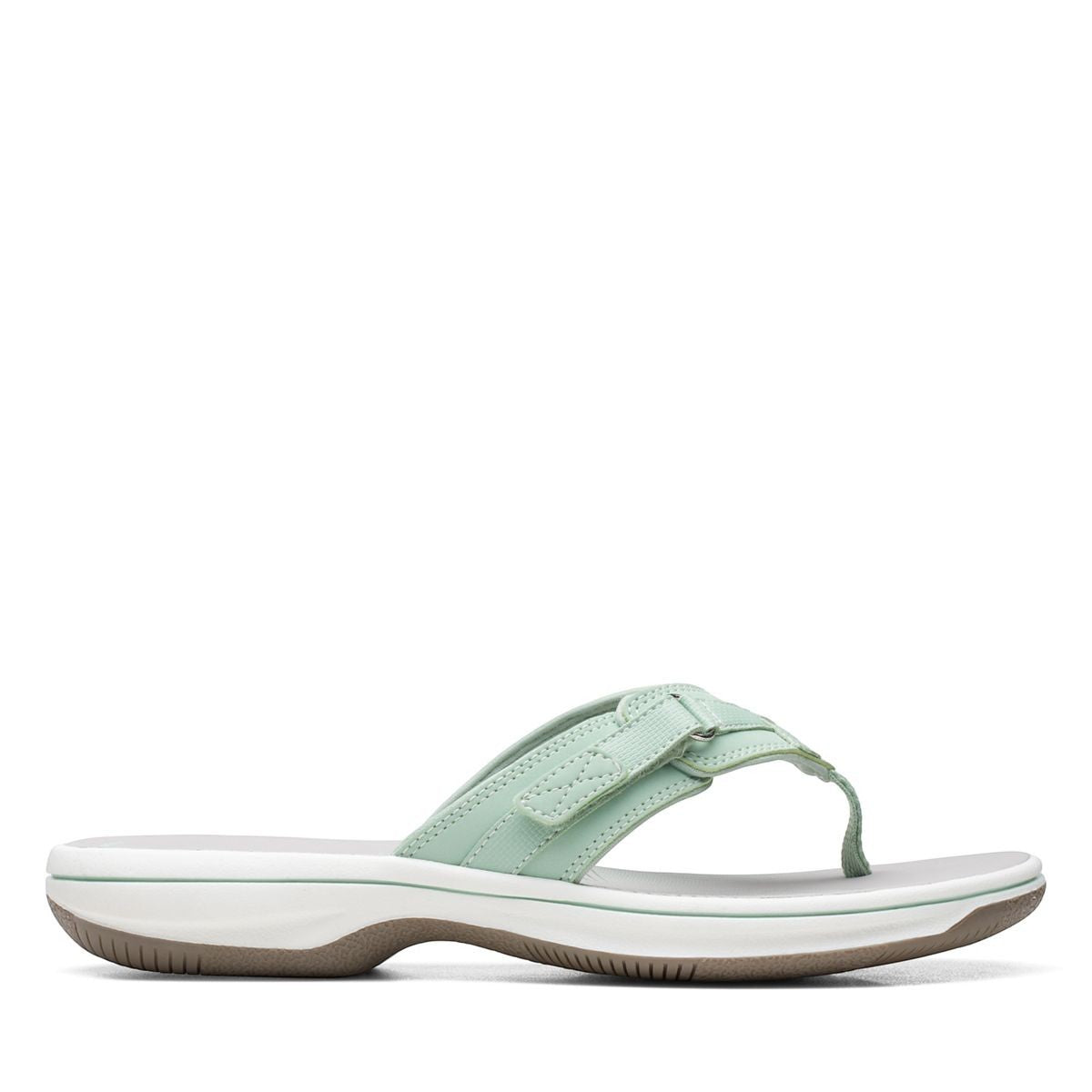 Clarks Breeze Sea flip-flops in pale green with a lightweight sole and adjustable strap closure. right view.