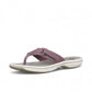 Sina Footwear Clarks Breeze Sea purple flip-flops with a lightweight sole and adjustable strap closure. Photo of left angle.