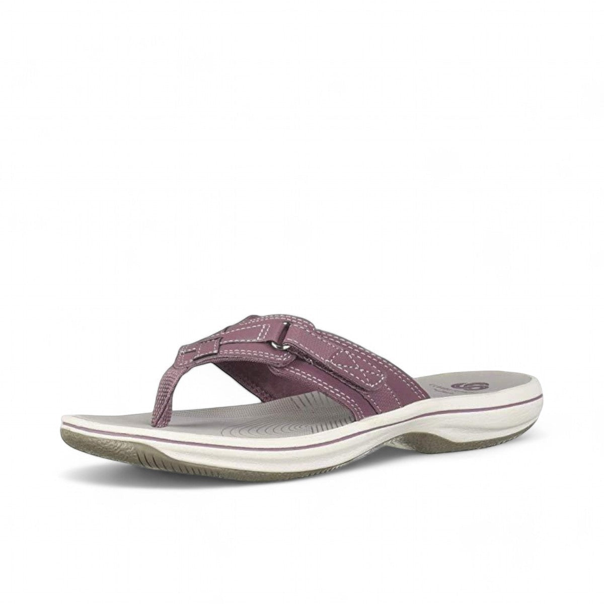 Sina Footwear Clarks Breeze Sea purple flip-flops with a lightweight sole and adjustable strap closure. Photo of left angle.