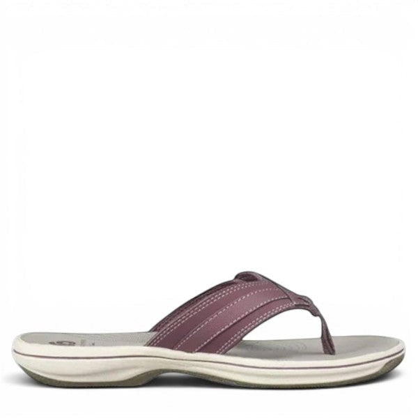 Sina Footwear Clarks Breeze Sea purple flip-flops with a lightweight sole and adjustable strap closure. Photo of right side.