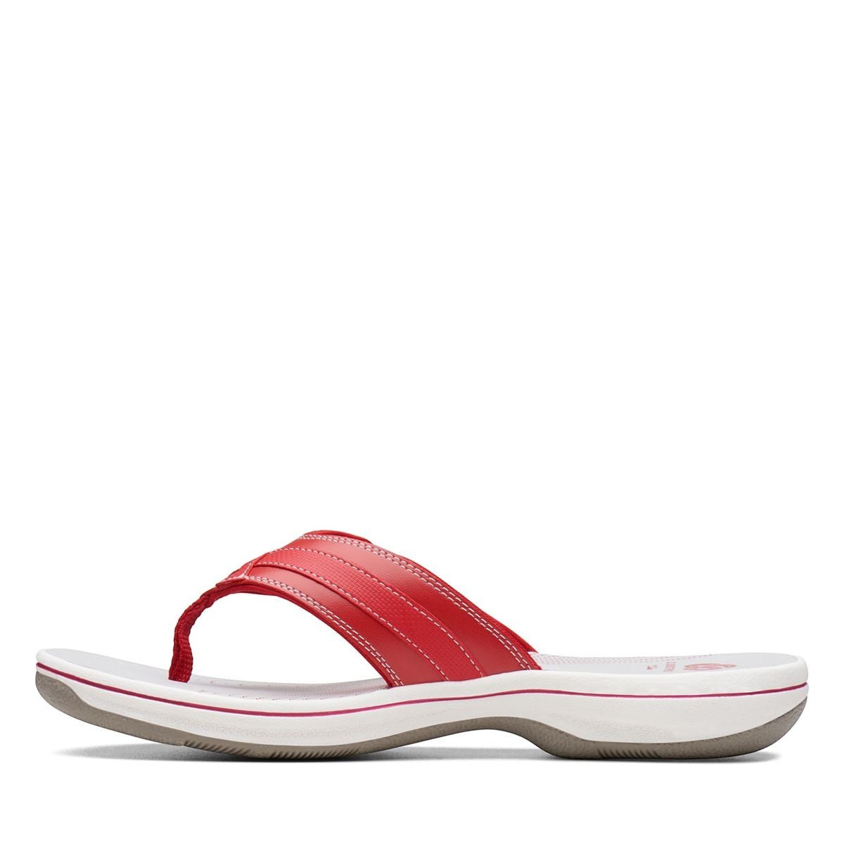 Clarks Breeze Sea red synthetic flip-flops with a lightweight sole and subtle strap closure. left view