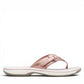 Clarks Breeze Sea rose gold flip-flop sandals with a lightweight sole and adjustable strap closure.
photo of the right side.