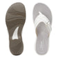 Clarks Breeze Sea white synthetic flip-flops with a subtle strap closure and lightweight sole. top view.