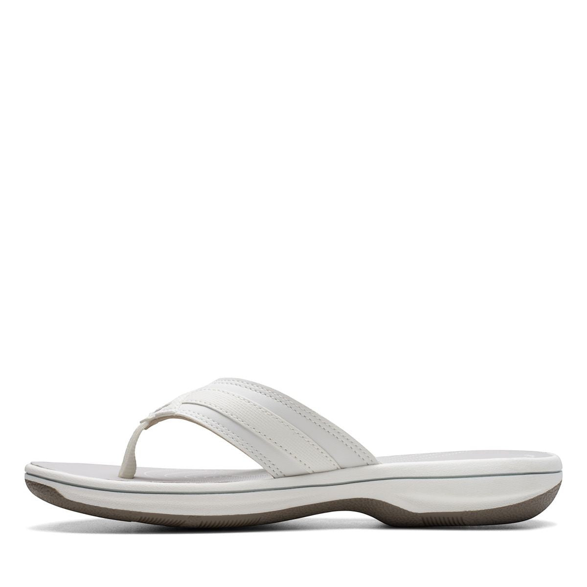Clarks Breeze Sea white synthetic flip-flops with a subtle strap closure and lightweight sole. left view.