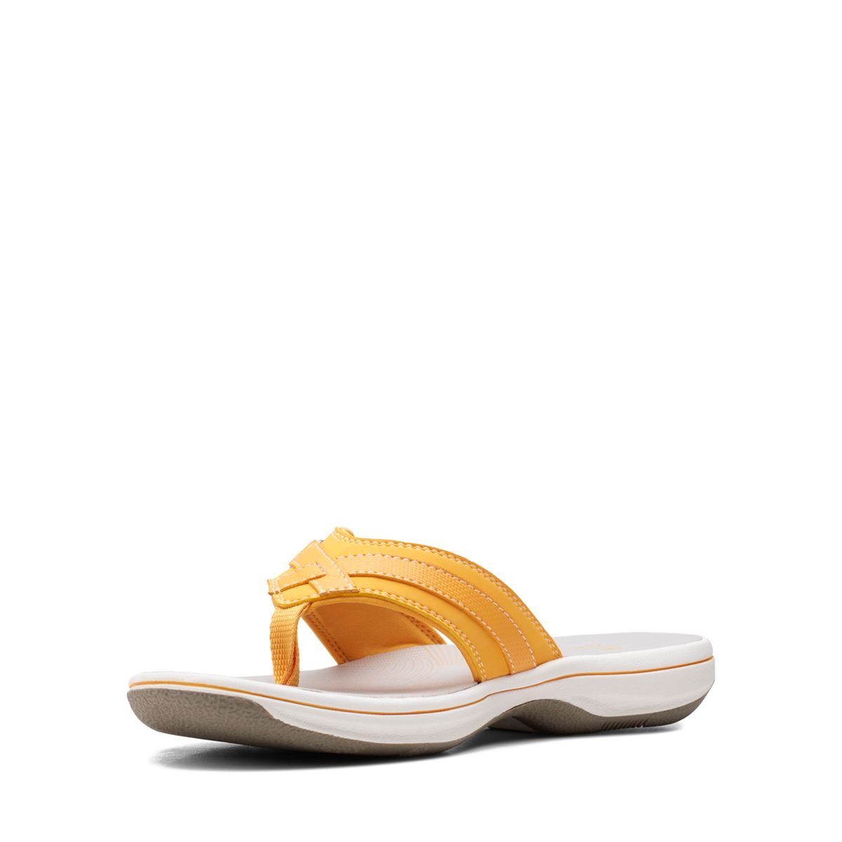 Clarks Breeze Sea flip-flops in burnt yellow with a lightweight sole and adjustable strap closure. left view.