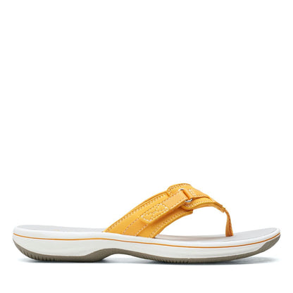 Clarks Breeze Sea flip-flops in burnt yellow with a lightweight sole and adjustable strap closure. right view
