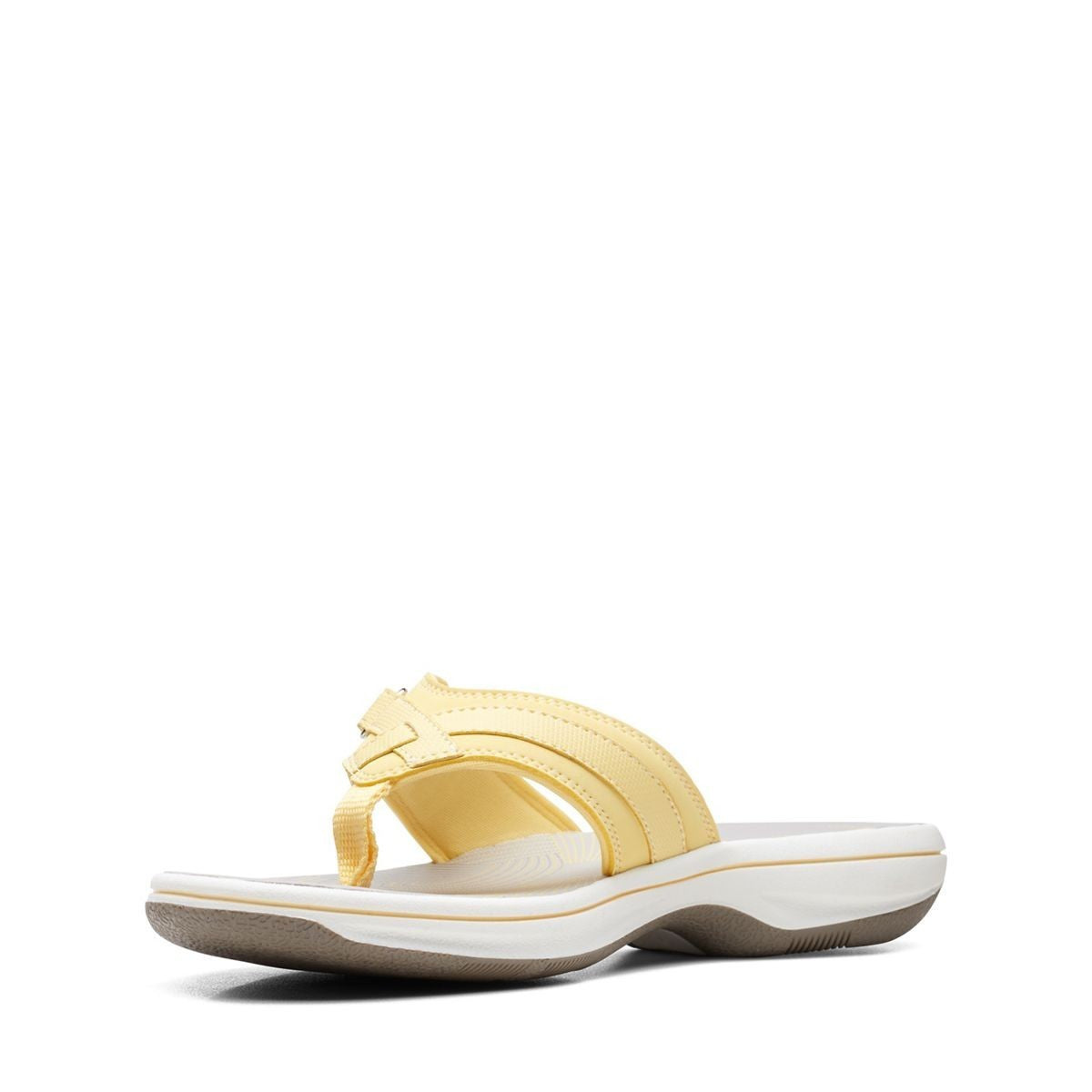 Clarks Breeze Sea yellow flip-flops with a lightweight sole and adjustable strap closure. front view.