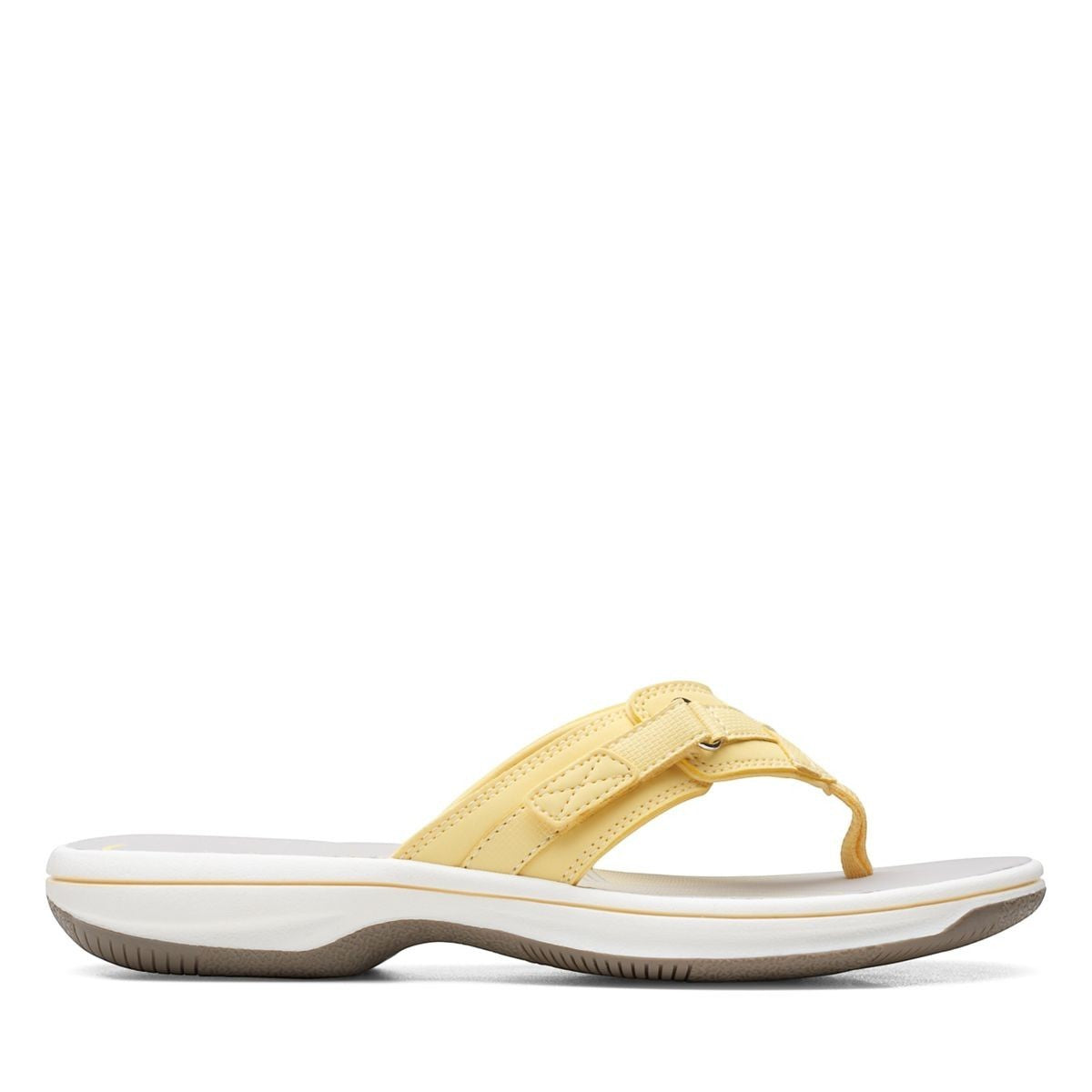 Clarks Breeze Sea yellow flip-flops with a lightweight sole and adjustable strap closure. right view.