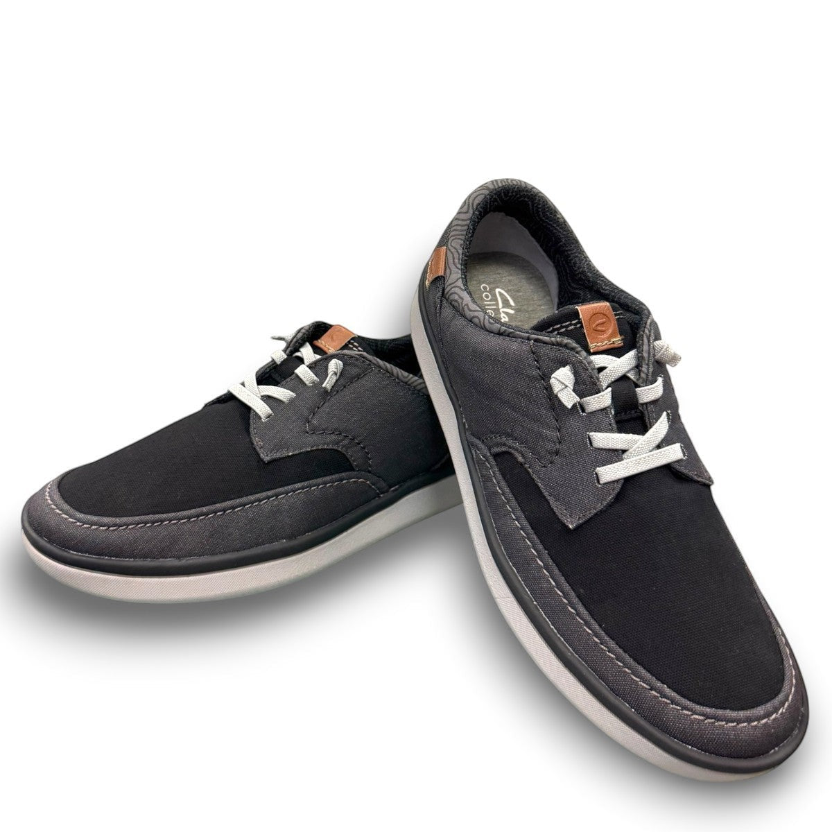 Clarks Cantal Low black canvas lace-up sneaker with a lightweight flexible EVA sole and patterned lining. front view