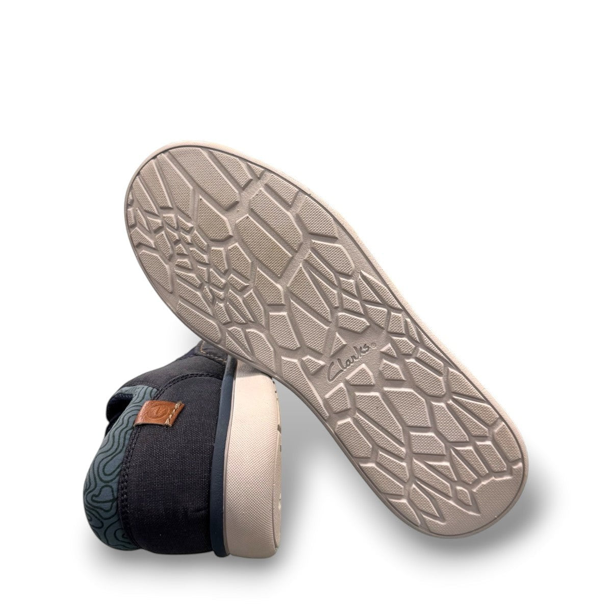 Clarks Cantal Low navy canvas lace-up sneaker with a lightweight EVA sole and patterned collar. bottom view.