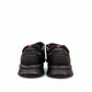 Clarks Cotrell Step men's slip-on shoe in black oily leather with a shock-absorbing rubber outsole. back view.
