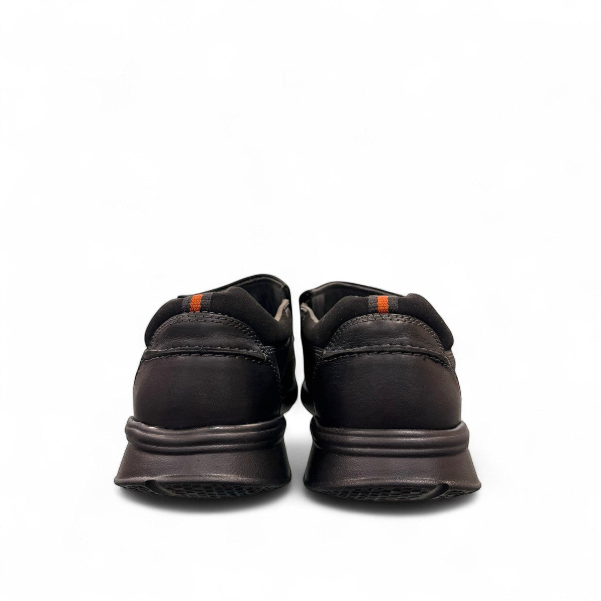 Clarks Cotrell Step men's slip-on shoe in black oily leather with a shock-absorbing rubber outsole. back view.
