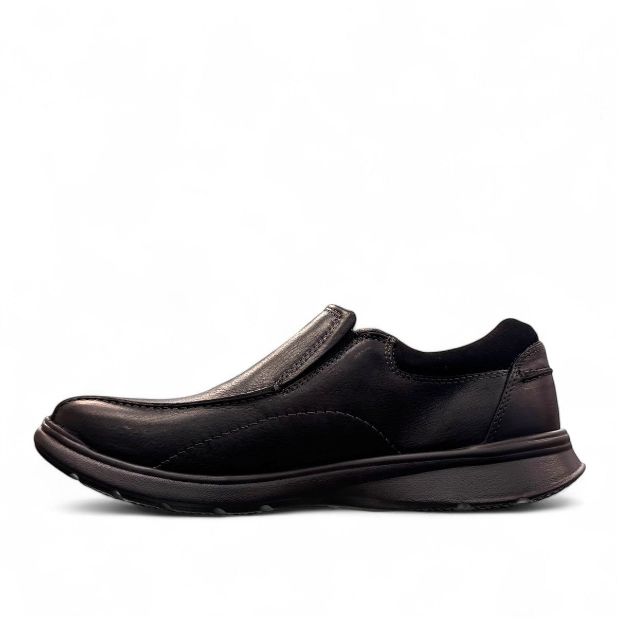 Clarks Cotrell Step men's slip-on shoe in black oily leather with a shock-absorbing rubber outsole. left view.