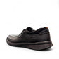 Clarks Cotrell Step men's slip-on shoe in black oily leather with a shock-absorbing rubber outsole. back view.