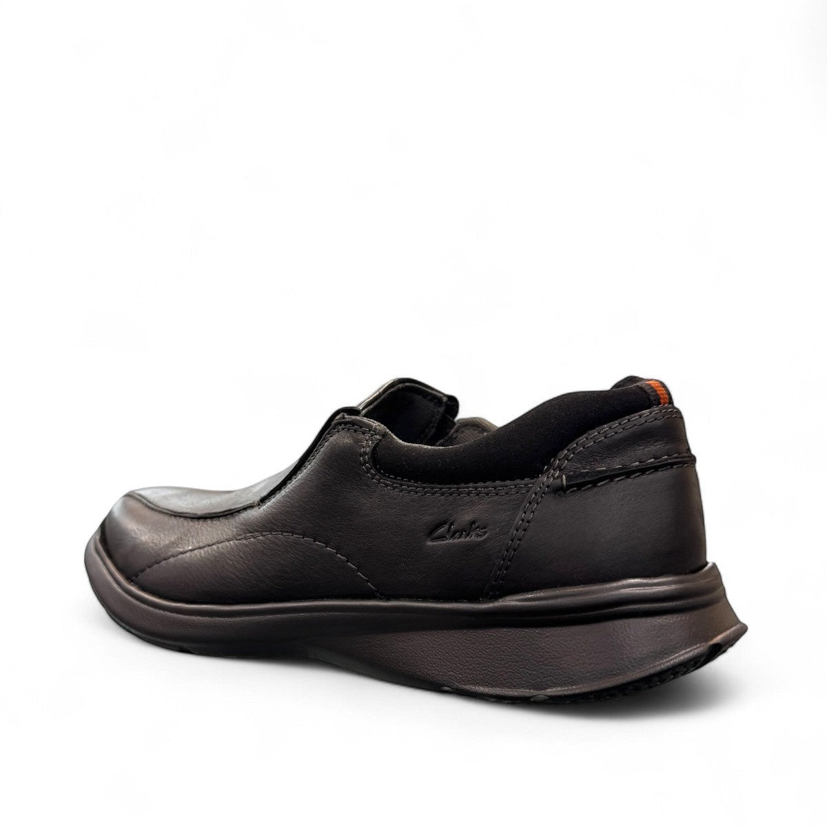 Clarks Cotrell Step men's slip-on shoe in black oily leather with a shock-absorbing rubber outsole. back view.