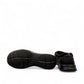 Clarks Cotrell Step men's slip-on shoe in black oily leather with a shock-absorbing rubber outsole. bottom view.