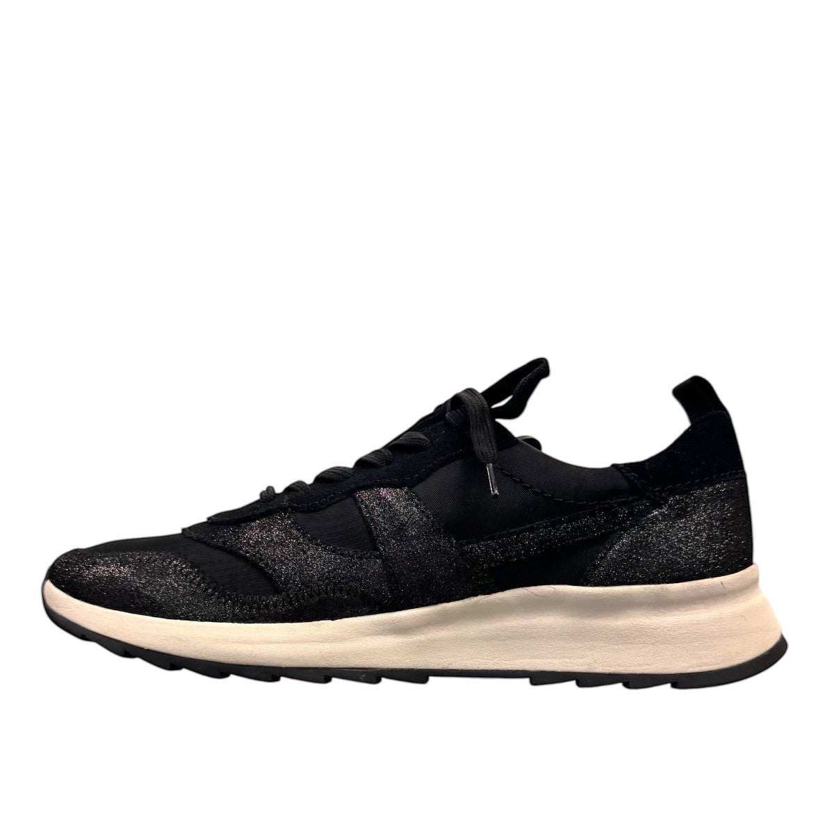 Clarks DashLite Jazz black leather sneaker with glitter accents and a lightweight white EVA midsole. left view.