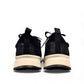 Clarks DashLite Jazz black leather sneaker with glitter accents and a lightweight white EVA midsole. back view.