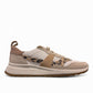 Clarks DashLite Jazz ivory leather sneaker with leopard print accents and a chunky white EVA midsole.
photo of the right side.