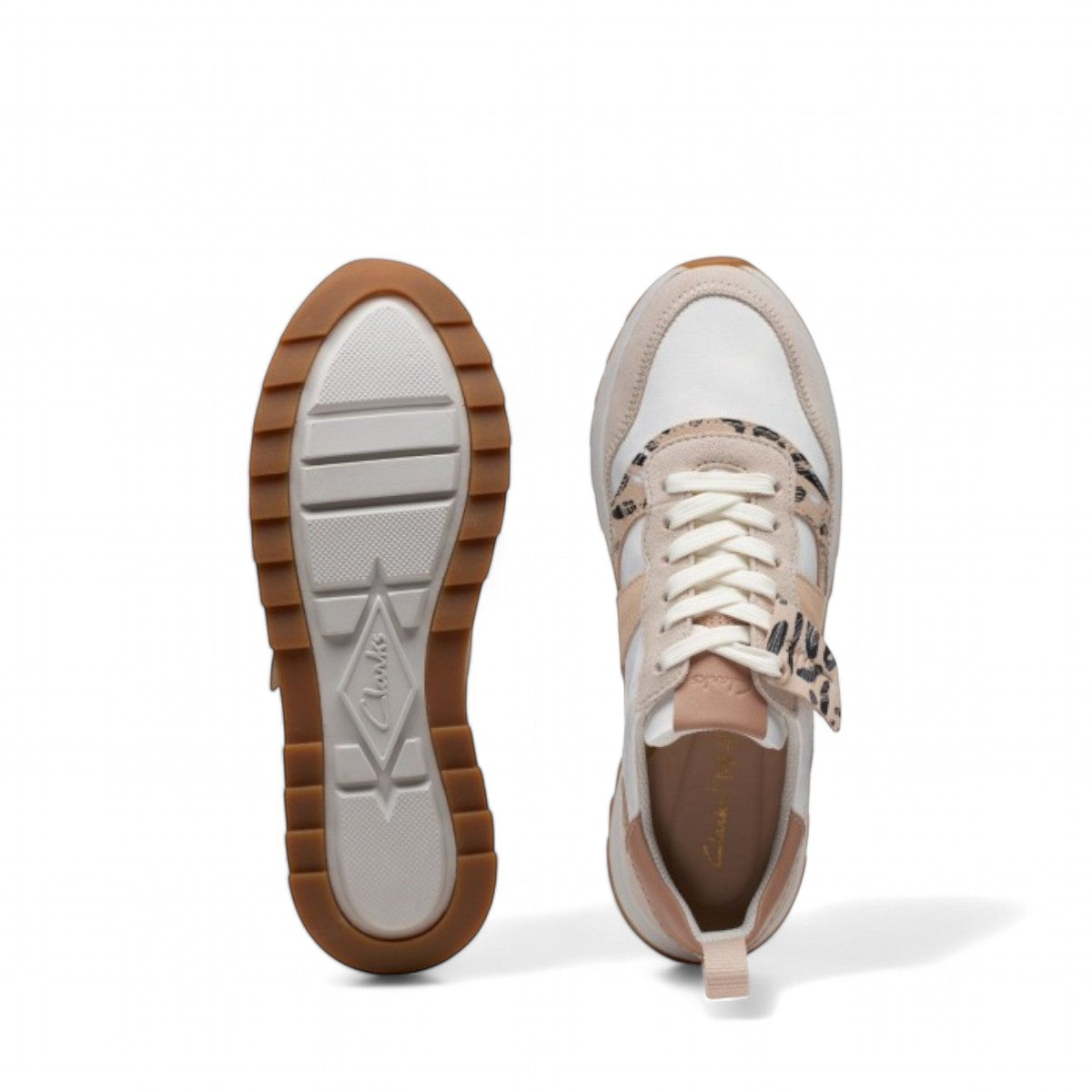 Clarks DashLite Jazz ivory leather sneaker with leopard print accents and a chunky white EVA midsole.
photo of the top.