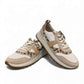 Clarks DashLite Jazz ivory leather sneaker with leopard print accents and a chunky white EVA midsole.
photo of the front.