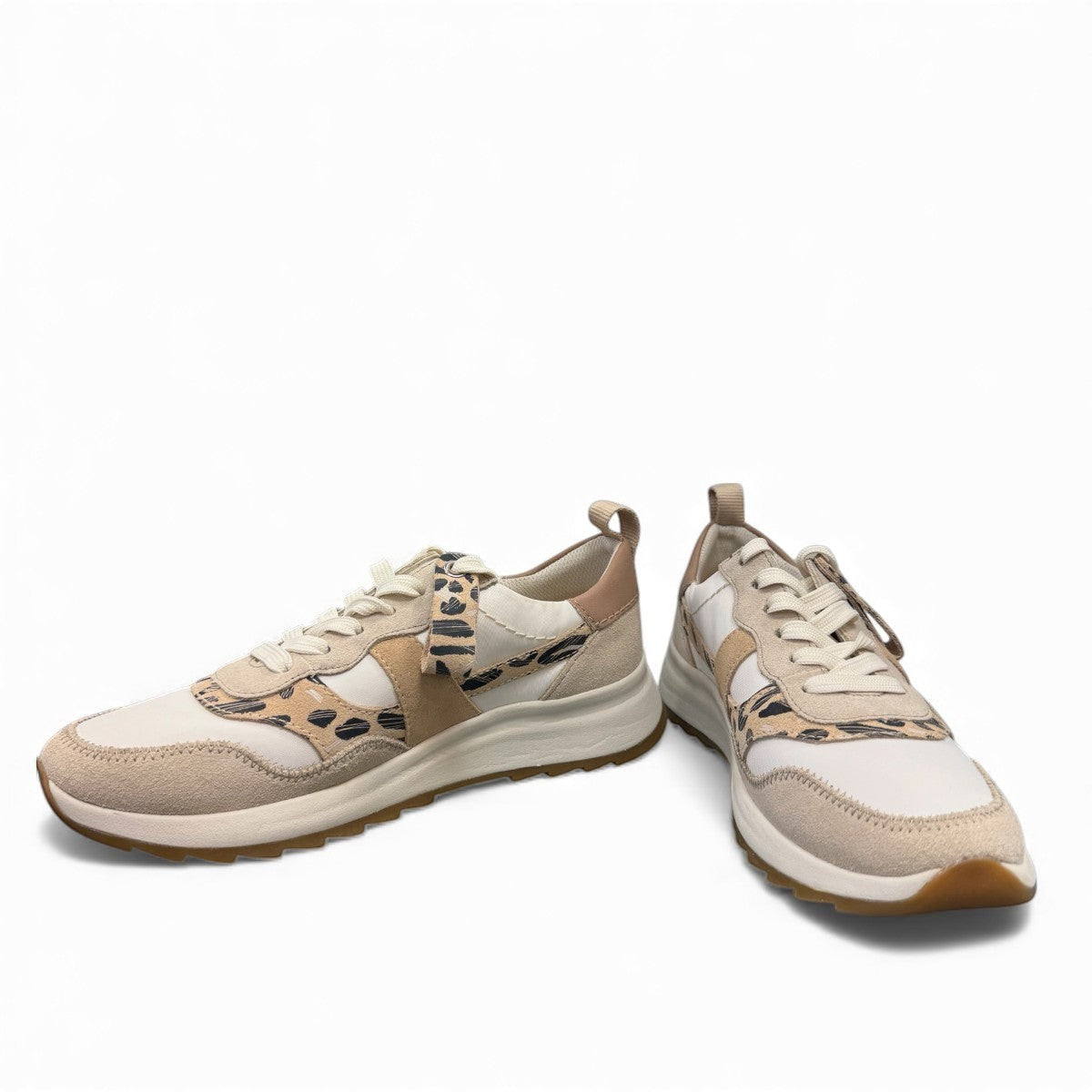Clarks DashLite Jazz ivory leather sneaker with leopard print accents and a chunky white EVA midsole.
photo of the front.