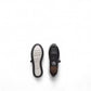 Clarks Dashlite Lo black leather sneaker with a white cushioned midsole and sporty retro silhouette.
photo of the bottom.