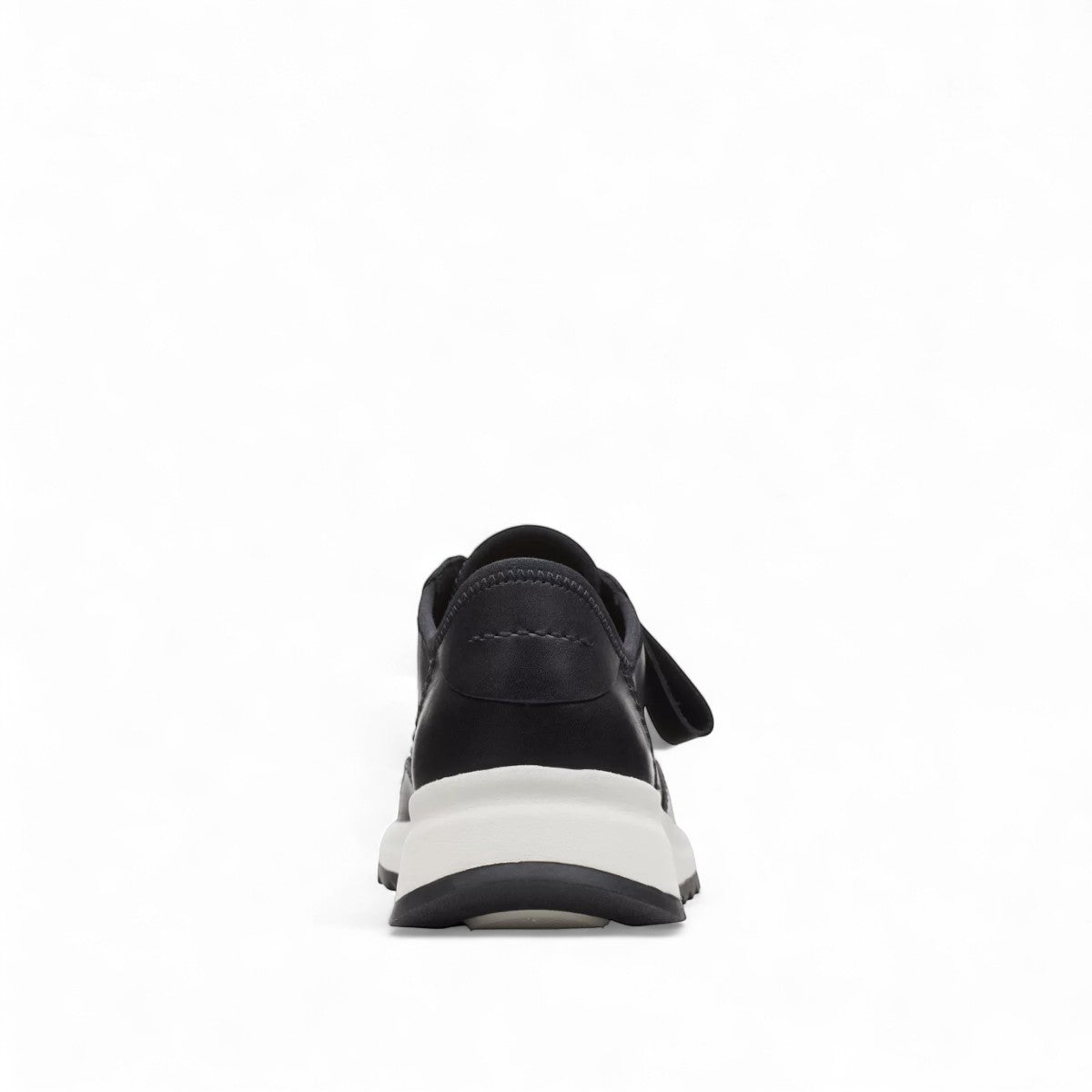 Clarks Dashlite Lo black leather sneaker with a white cushioned midsole and sporty retro silhouette.
photo of the back.