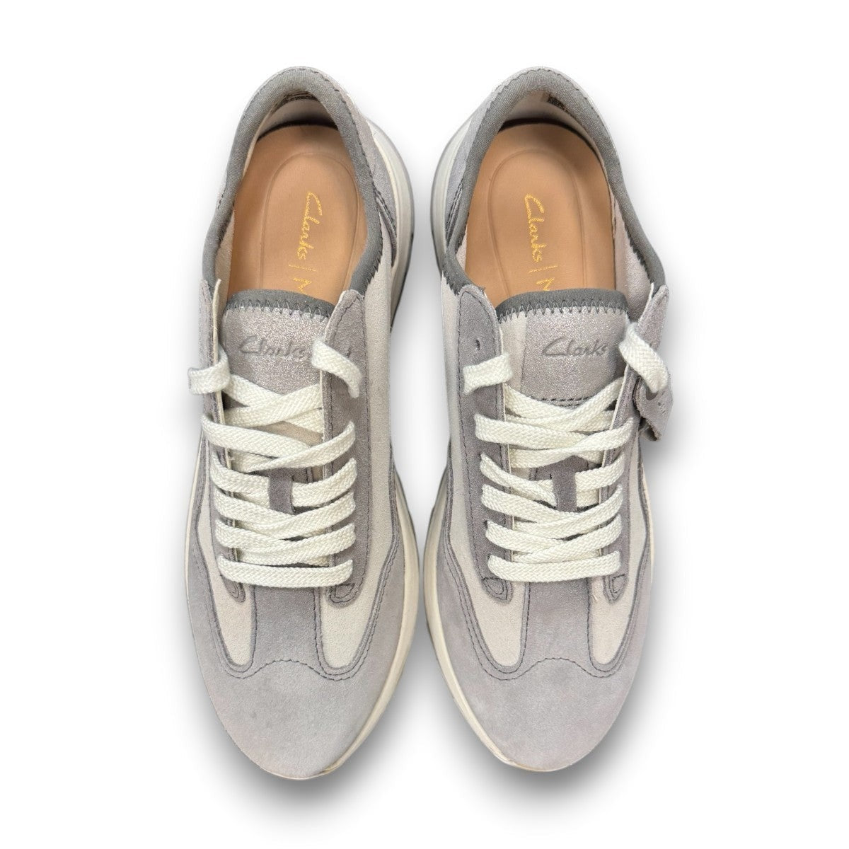 Clarks Dashlite Lo grey suede sneakers with a lightweight EVA midsole and gum rubber sole. photo of the top.