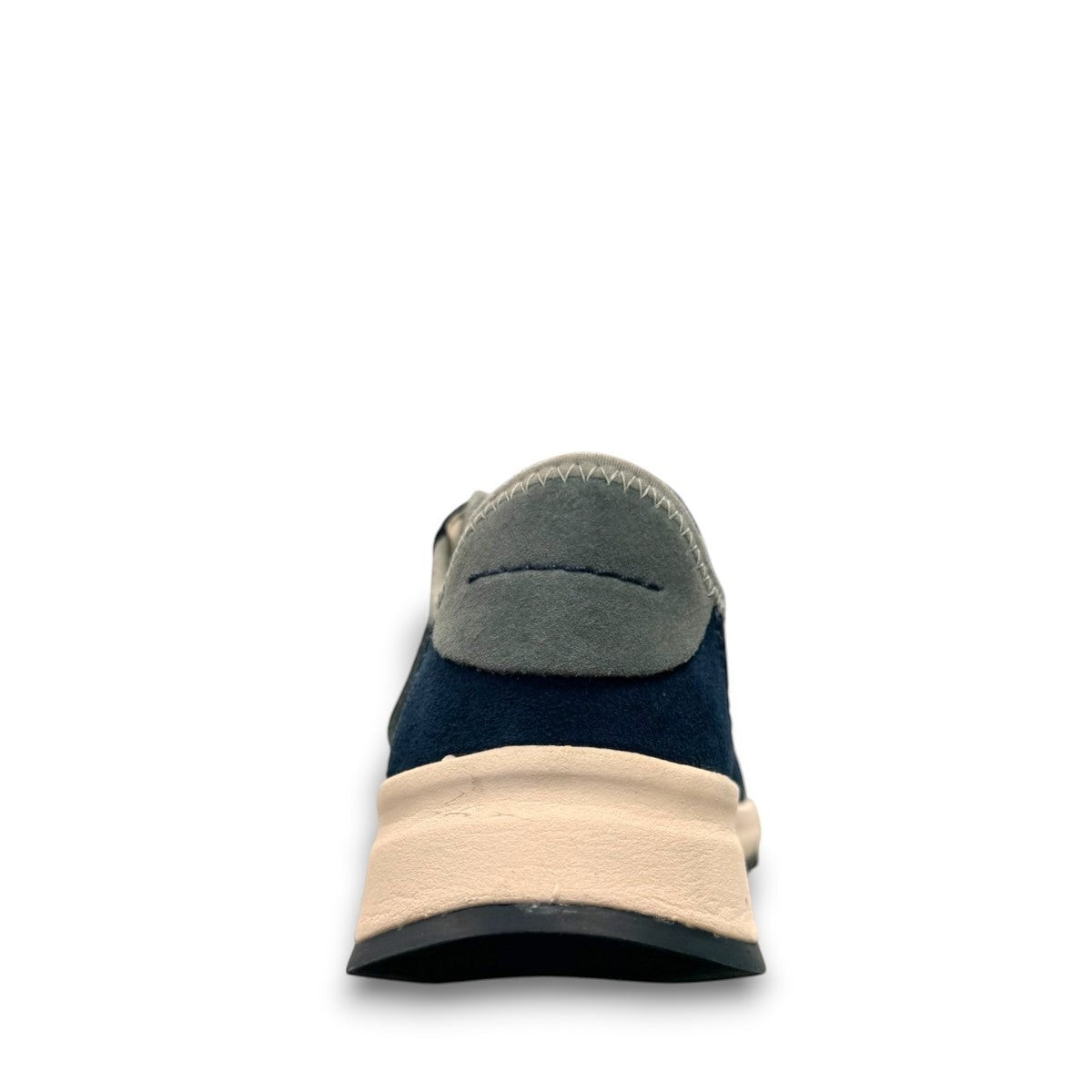 Clarks Dashlite Lo sneakers in teal leather with a retro jogger silhouette and gum sole. photo of the back.