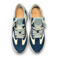 Clarks Dashlite Lo sneakers in teal leather with a retro jogger silhouette and gum sole. photo of the  top.