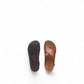 Clarks Elayne Cross dark tan leather sandal with a cork footbed and adjustable buckle strap. top view.