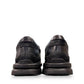 Clarks Gessler Step black leather slip-on casual shoe with a lightweight EVA sole and stitched detail. photo of the back.